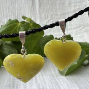 heart shaped serpentine pendants with a silver link natural green rock crystal