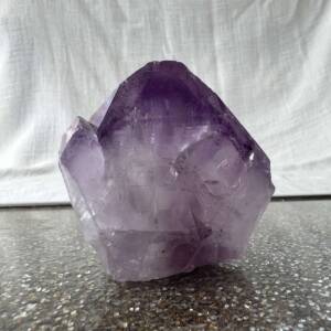 amethyst point cut base natural formation of quartz with manganese