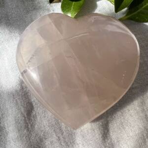 rose quartz heart natural pink crystal carved and polished stone art object
