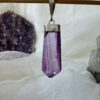 purple fluorite pendant with a silver plate cap and link