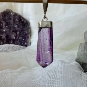 purple fluorite pendant with a silver plate cap and link