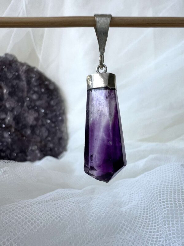 purple fluorite pendant with a silver plate cap and link