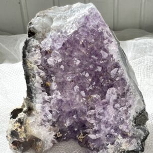 a cut base amethyst cluster standing house decor boho chic crown chakra third eye chakra sahasrara ajna purple crystal