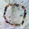 a mix tourmaline bracelet with pink green gold and black tourmaline gemstones (Na,Ca)(Mg,Li,Al,Fe2+)3Al6 (BO3)3Si6O18(OH)4 crystal jewellery healing boho chic
