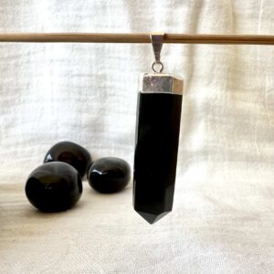 natural volcanic obsidian pendant black crystal necklace polished lava gems obsidian jewellery New Zealand online crystal shop SiO2 + MgO, Fe3O4 muladhara root chakra healing grounding crystal
