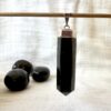 natural volcanic obsidian pendant black crystal necklace polished lava gems obsidian jewellery New Zealand online crystal shop SiO2 + MgO, Fe3O4 muladhara root chakra healing grounding crystal