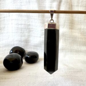 natural volcanic obsidian pendant black crystal necklace polished lava gems obsidian jewellery New Zealand online crystal shop SiO2 + MgO, Fe3O4 muladhara root chakra healing grounding crystal