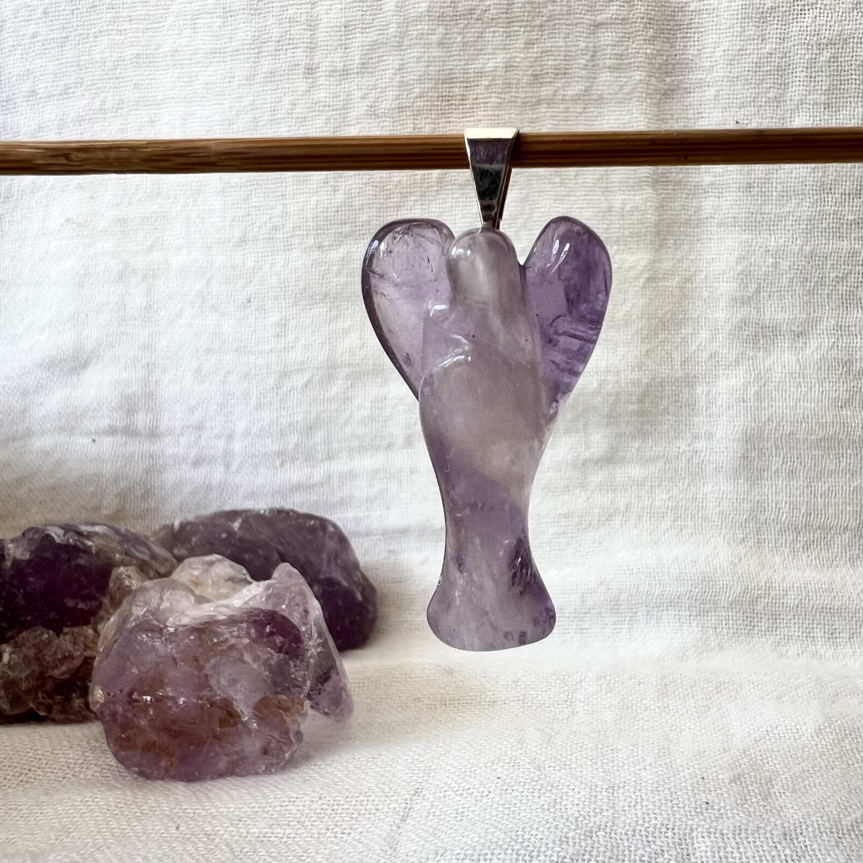 amethyst angel pendant necklace natural purple quartz crystal jewellery SiO2 with manganese sahasrara crown chakra ajna third eye chakra New Zealand crystal shop