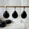natural volcanic obsidian pendant black crystal necklace polished lava gems obsidian jewellery New Zealand online crystal shop SiO2 + MgO, Fe3O4 muladhara root chakra healing grounding crystal