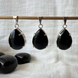 natural volcanic obsidian pendant black crystal necklace polished lava gems obsidian jewellery New Zealand online crystal shop SiO2 + MgO, Fe3O4 muladhara root chakra healing grounding crystal