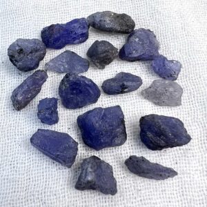 natural tanzanite gemstones raw gems blue crystals zoisite (Ca2Al3(SiO4)(Si2O7)O(OH)) third eye ajna chakra jewellery making power grids